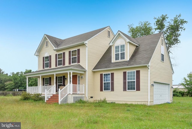  - view of front of home featuring a porch and an attached garage