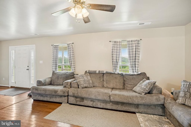  - living room featuring wood finished floors and a ceiling fan