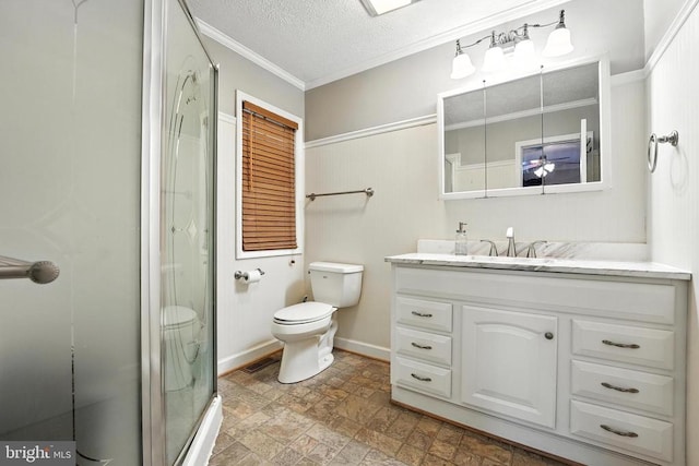  - bathroom with stone finish flooring, vanity, ornamental molding, a shower stall, and a textured ceiling