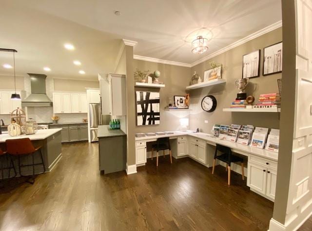 office with dark hardwood / wood-style flooring and ornamental molding