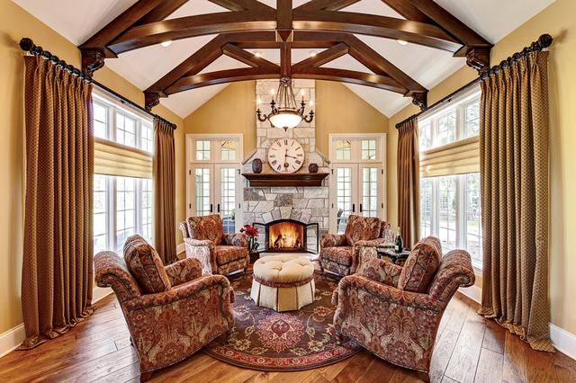 7S410 Arbor Dr, Naperville, IL 60540 - sitting room featuring beamed ceiling, a notable chandelier, dark hardwood / wood-style flooring, a stone fireplace, and high vaulted ceiling