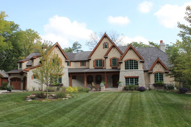 7S410 Arbor Dr, Naperville, IL 60540 - view of front facade featuring a front yard and a garage