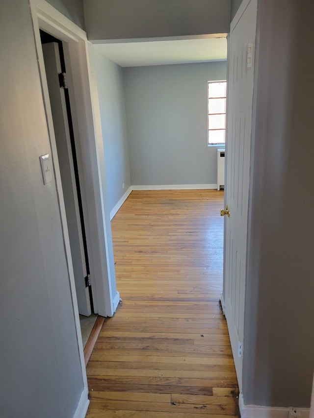 hallway featuring light hardwood / wood-style floors