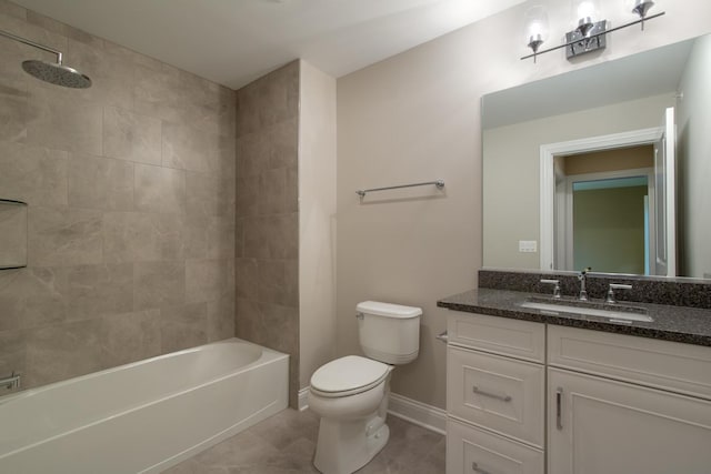 full bathroom featuring tiled shower / bath combo, tile flooring, toilet, and vanity