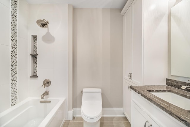 full bathroom with tile flooring, toilet, vanity, and tiled shower / bath