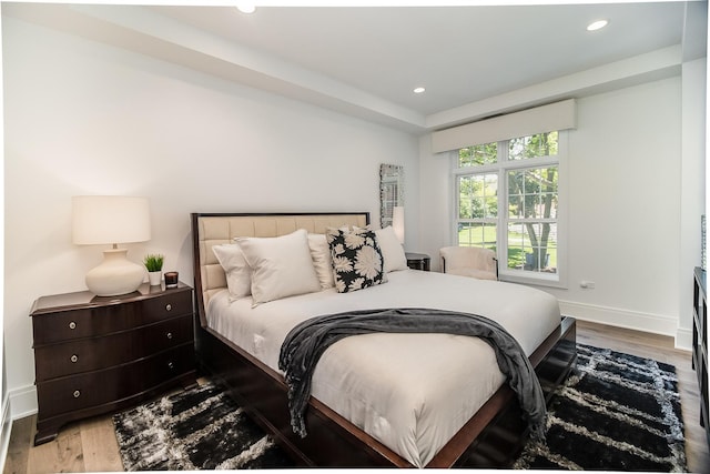 bedroom featuring wood-type flooring