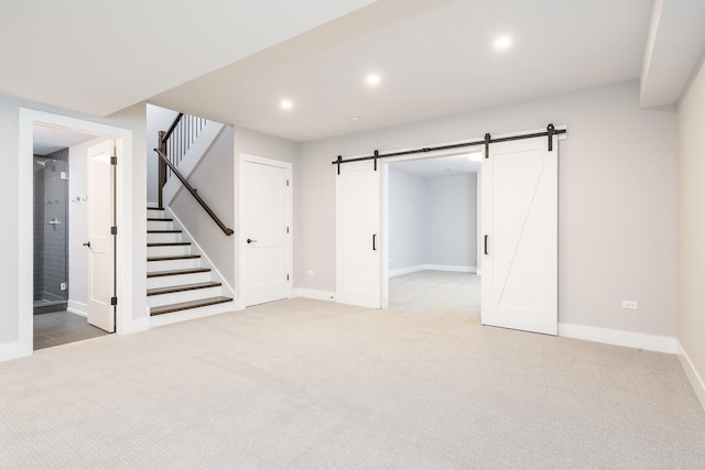 interior space featuring a barn door