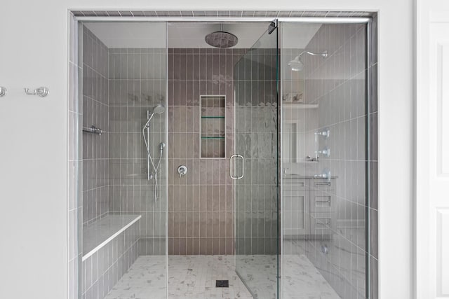 bathroom featuring an enclosed shower