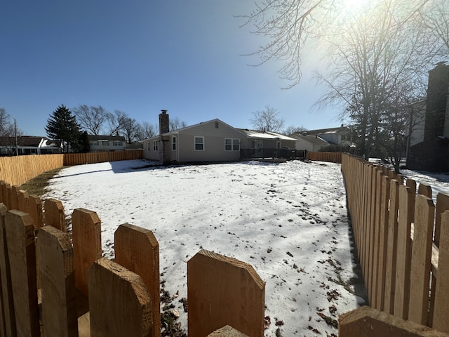 view of snowy yard