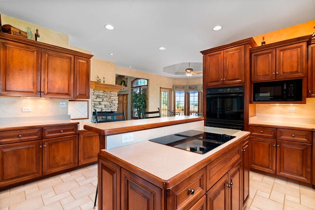 kitchen featuring tasteful backsplash, ceiling fan, light tile floors, and black appliances