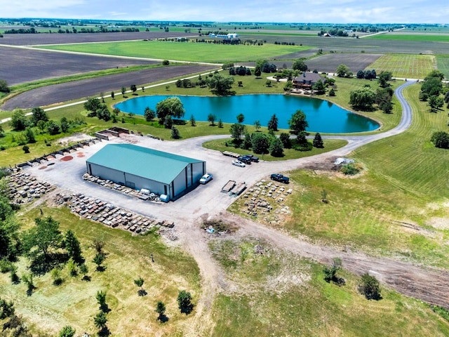 aerial view featuring a rural view and a water view