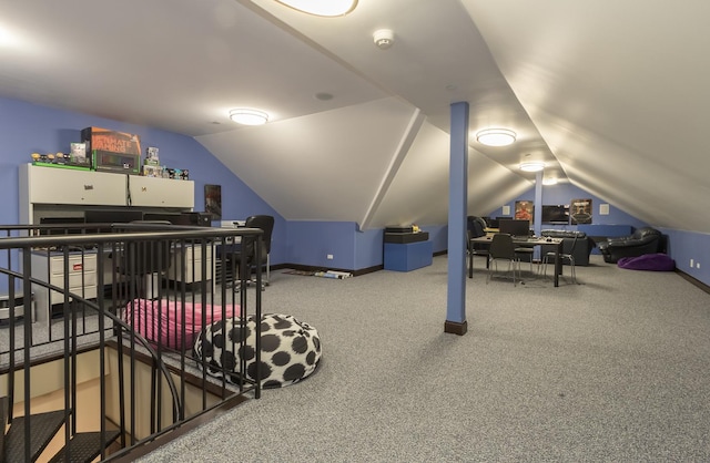 carpeted bedroom with vaulted ceiling