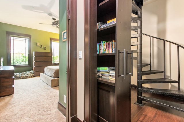 interior space featuring dark hardwood / wood-style floors and ceiling fan