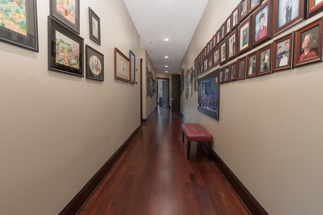 corridor with dark wood-type flooring