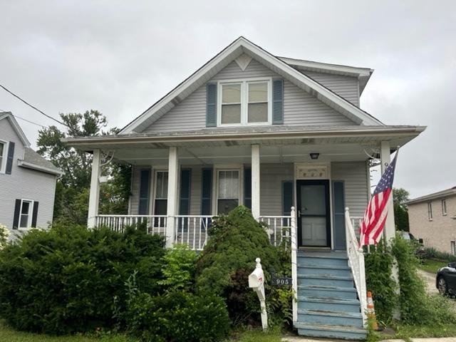 bungalow-style home with a porch