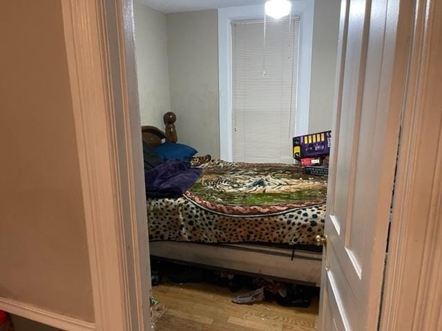 bedroom featuring hardwood / wood-style floors