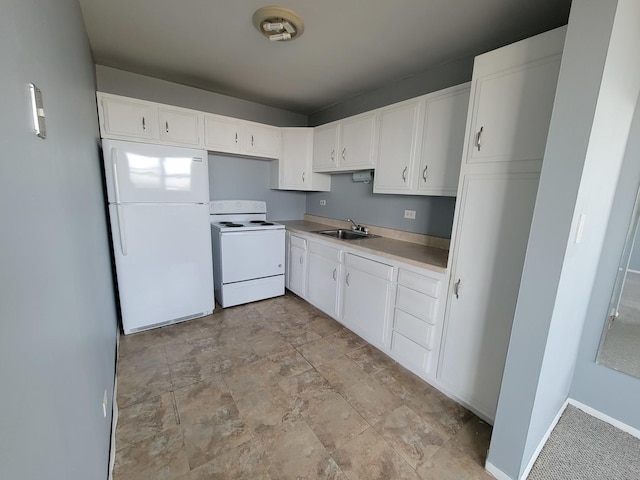 kitchen with white appliances, white cabinetry, sink, and light tile floors