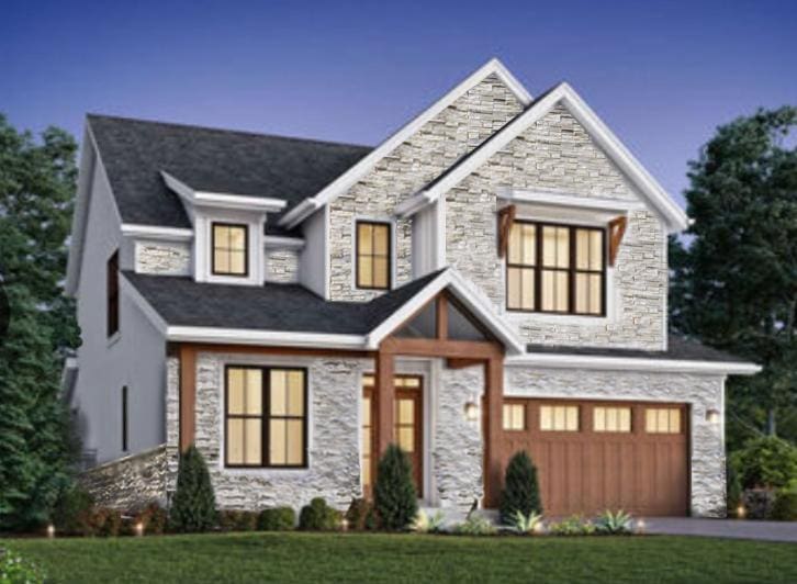 view of front facade with a front lawn and a garage