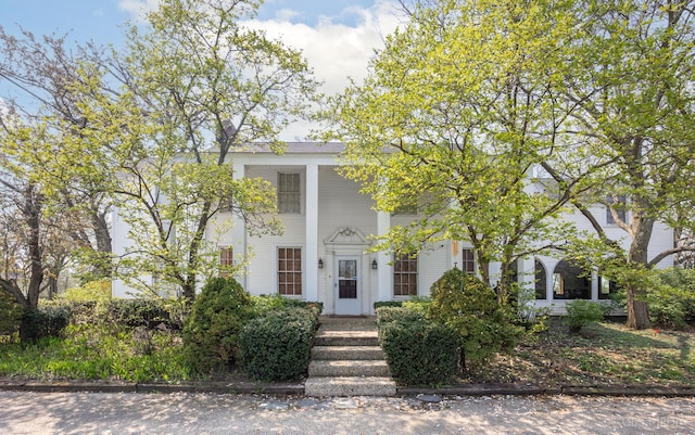 view of greek revival inspired property