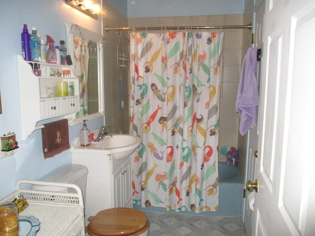 full bathroom featuring shower / bath combination with curtain, toilet, and vanity