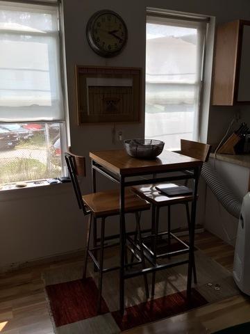 dining space featuring hardwood / wood-style flooring