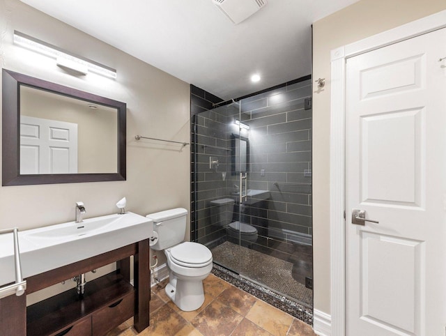 bathroom featuring toilet, tile floors, an enclosed shower, and vanity