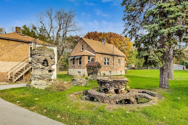 view of front of house featuring a front yard