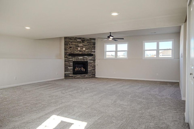 8357 Dylan Dr, Merrillville, IN 46410 - unfurnished living room featuring carpet, a fireplace, and baseboards