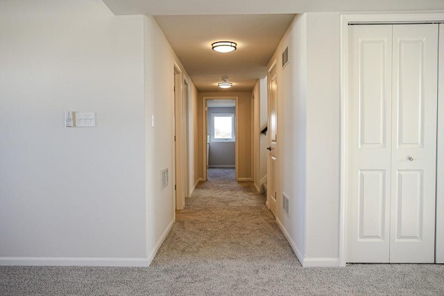 8357 Dylan Dr, Merrillville, IN 46410 - hall with light carpet, baseboards, and visible vents