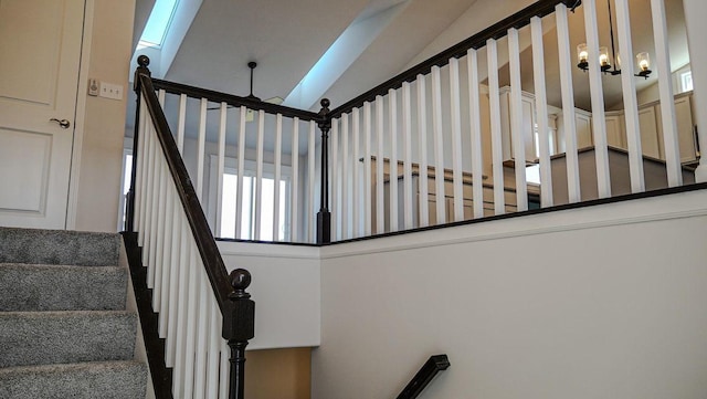 8357 Dylan Dr, Merrillville, IN 46410 - stairway featuring lofted ceiling