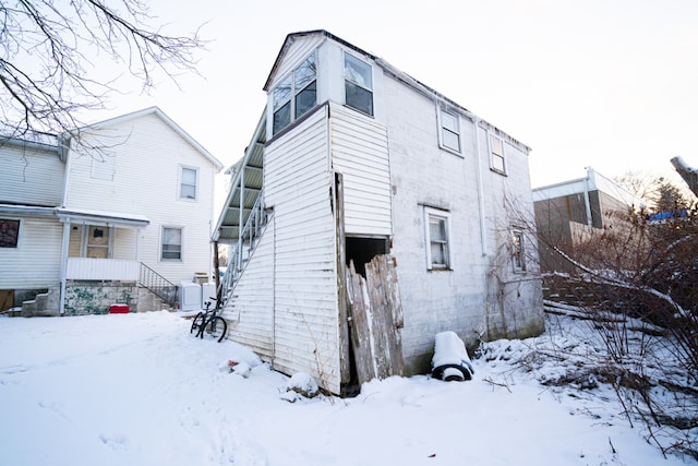 view of snow covered property