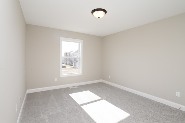 view of carpeted spare room