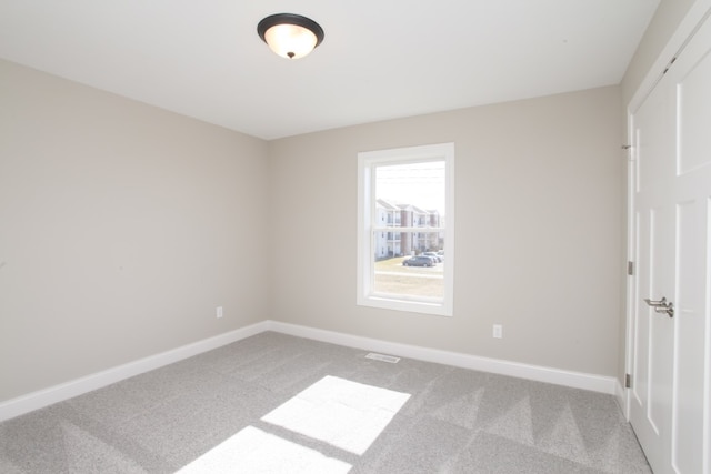 view of carpeted spare room