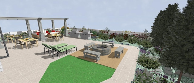 view of terrace with a pergola and an outdoor kitchen