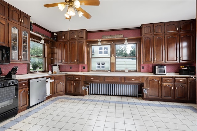 kitchen featuring black appliances, decorative backsplash, dark brown cabinetry, and ceiling fan