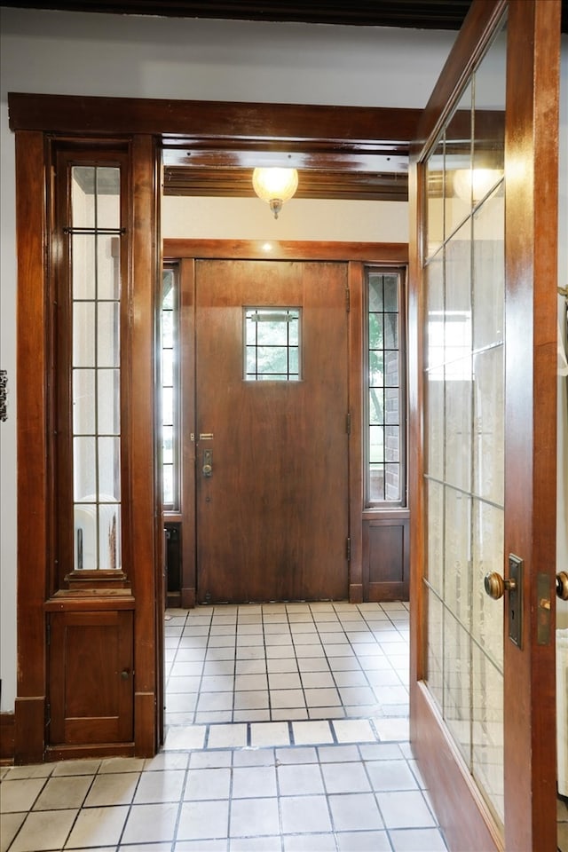 doorway to outside featuring light tile patterned floors