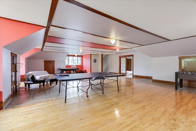 rec room with light hardwood / wood-style floors