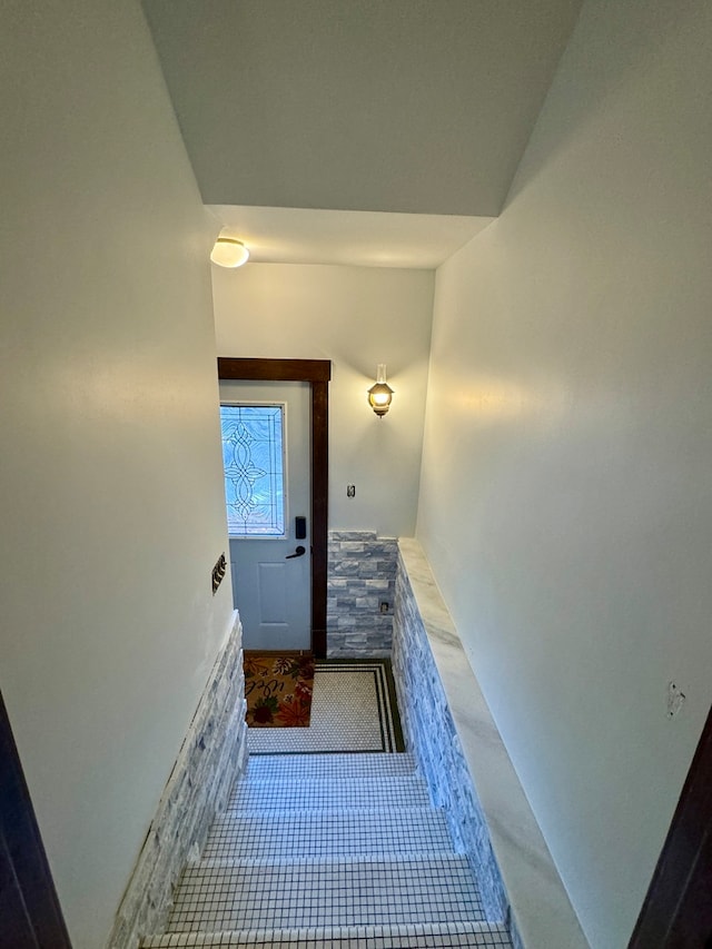 staircase featuring tile patterned floors