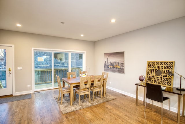 2520 S Stark St, Chicago, IL 60608 - dining room featuring light hardwood / wood-style flooring