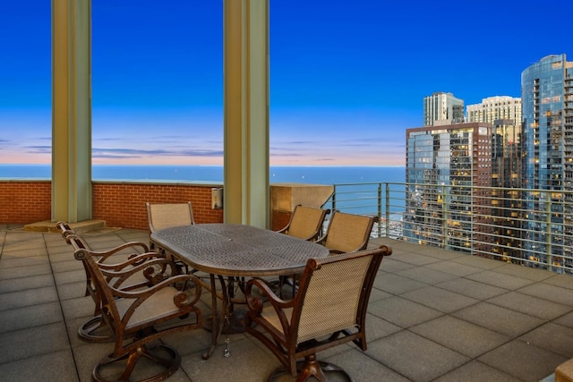 dining space featuring a water view