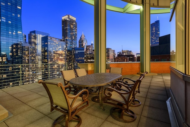 view of patio terrace at dusk