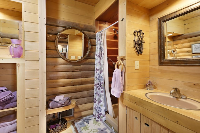 bathroom featuring vanity with extensive cabinet space