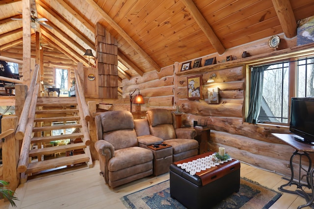 living room with wooden ceiling, beamed ceiling, and light hardwood / wood-style floors