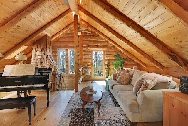 living room with light wood-type flooring, vaulted ceiling with beams, wood ceiling, and rustic walls