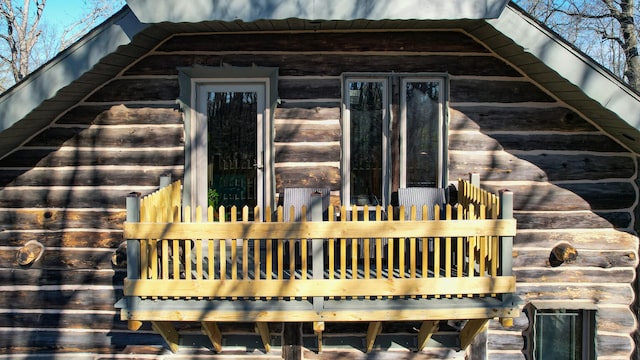 exterior space featuring log walls