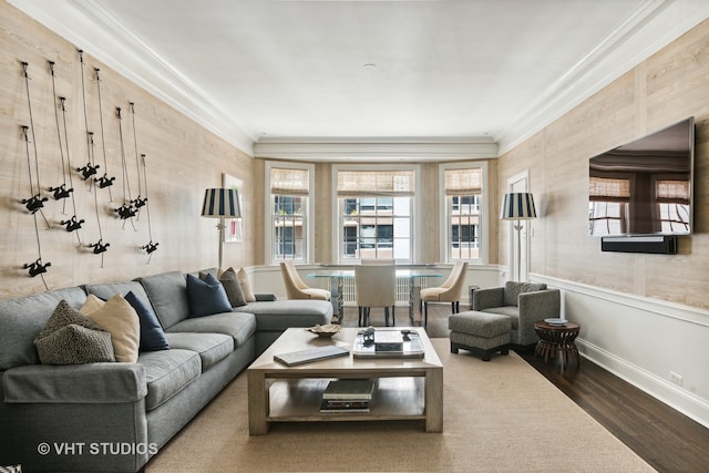 living room with ornamental molding, dark hardwood / wood-style floors, and plenty of natural light