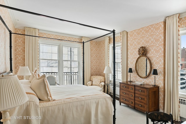 carpeted bedroom with multiple windows, crown molding, and radiator heating unit