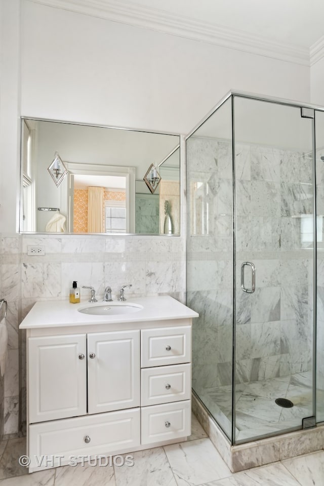 bathroom with crown molding, tile walls, vanity, and tile flooring