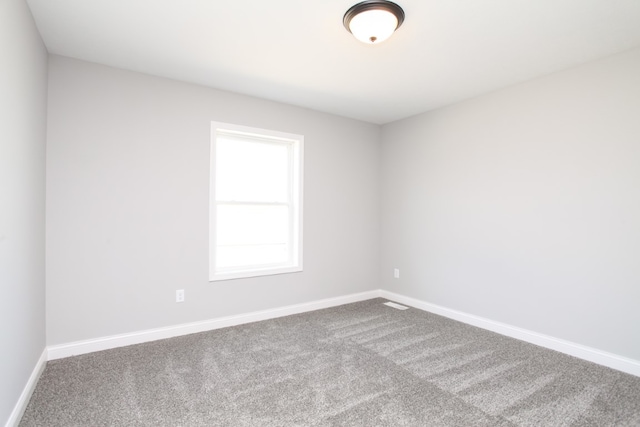 unfurnished room with carpet