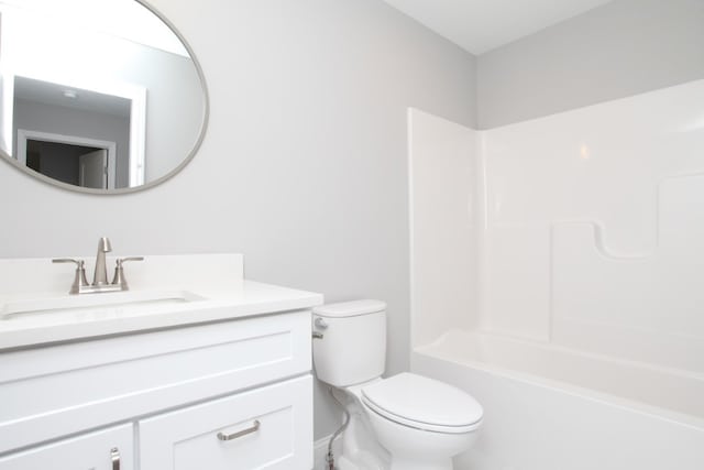 full bathroom featuring toilet, washtub / shower combination, and oversized vanity